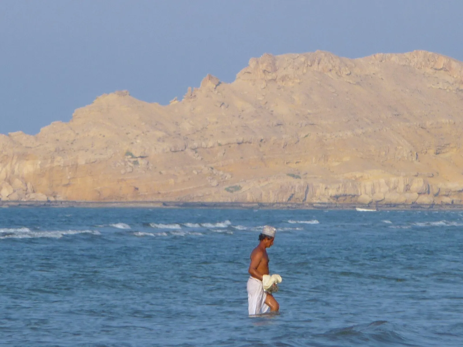 A fisherman at Sawadi (Wikimedia Commons)